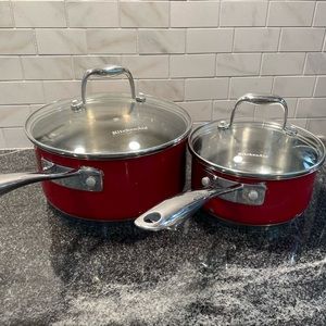 Two KitchenAid saucepans with lids